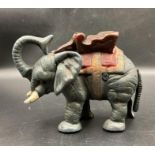 A Vintage style elephant money box in cast metal.