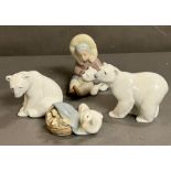 A collection of four Lladro figurines