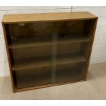 Mid Century glazed bookcase (H87cm W90cm D23cm)