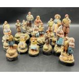 A selection of terracotta fisherman pottery figurines