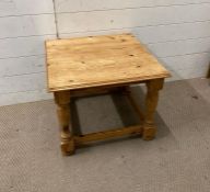 A pine square coffee table on turned legs with bun feet (H45cm Sq57cm)