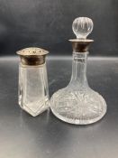 A hallmarked silver topped sugar shaker and a hallmarked silver necked decanter (18cm H)