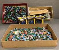 A large collection of plastic toys, soldiers and medieval knights