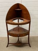 A mahogany corner wash stand on tapering legs (H123cm D45cm)