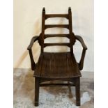Arts and Crafts chair with a tapering ladder back