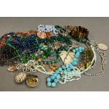 A selection of costume jewellery to include necklaces and jewellery