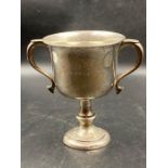 A two handled engraved silver trophy, hallmarked for Birmingham 1925 (Approximate Total weight
