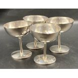 A set of four hallmarked silver goblets by Adie Brothers Ltd, hallmarked for Birmingham 1926.(