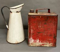 An enamel pitcher jug (H36cm) and a vintage red petrol can (H29cm)