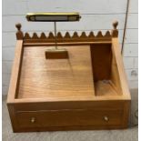 A light oak pulpit with reading light (H65cm W74cm D40cm)