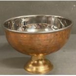 A copper and metal Courvoisier punch bowl