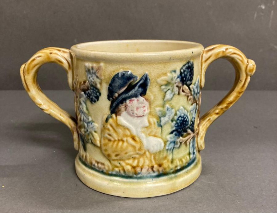 A Staffordshire two handled frog mug