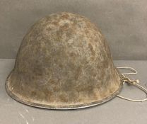 A British military helmet dated 1973