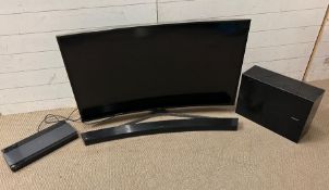 A Samsung curve TV with sound bar model UE48JU6740U