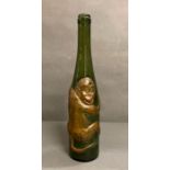 A German Aftentaler Spatburgunder embossed monkey wine bottle