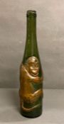 A German Aftentaler Spatburgunder embossed monkey wine bottle