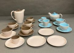 A selection of Poole pottery cups, saucers, coffee pot and a tea pot