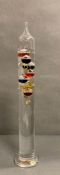 A hand made German Galileo thermometer