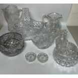 A large selection of cut glass including glass basket, rose bowls etc
