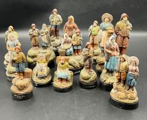 A selection of terracotta fisherman pottery figurines