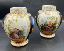 A pair of Dresden porcelain vases, each panel decorated with country scenes (H16cm)