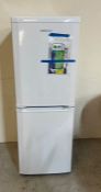 A Beko fridge freezer (H152cm W22cm D22cm)
