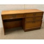 A dressing table with drawer to kneehole and three drawers to side with brass handles (H70cm