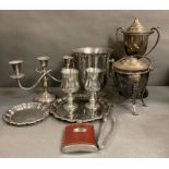 A volume of silver plated items to include an ice bucket.