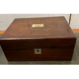 A rosewood dressing table box with fitted jewellery compartments