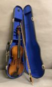 A cased violin AF