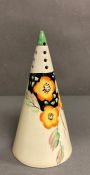 A conical sugar shaker in the style of Clarice Cliff