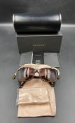 A boxed pair of Bulgari ladies sunglasses in Havana brown