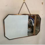 An Art Deco style copper framed and bevel edged mirror 69cm x 40cm