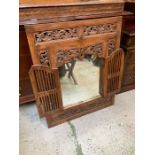 A Tibetan carved wooden mirror with doors 95x79