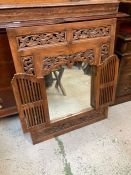 A Tibetan carved wooden mirror with doors 95x79