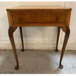 A burr walnut single drawer side table on carved cabriole legs (H72cm W62cm D44cm)