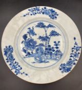 An 18th Century Chinese Blue and white plate with floral design. (23.5cm Diameter)