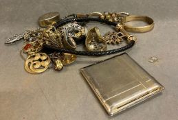 A selection of costume jewellery and watches.