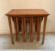 A set of five nesting Mid Century tables Height 56. 42 x 52