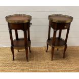 A pair of Theodore Alexander regency style side tables