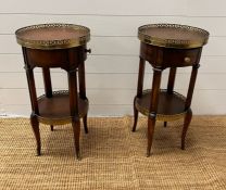 A pair of Theodore Alexander regency style side tables