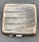 A silver cigarette case by M H Meyer Ltd, hallmarked for Birmingham 1925