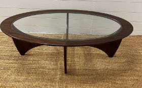 A G-Plan Astro oval table with glass top (H42cm W122cm D66cm)