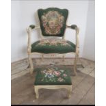 A louis style chair and footstool upholstered in green