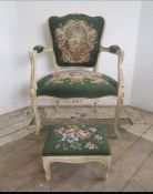 A louis style chair and footstool upholstered in green