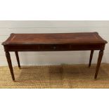 A console table with drawer to centre and fluted legs (H70cm W138cm D40cm)