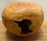 A teak stool with smooth shape with cracks and organic form (H37cm)