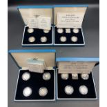 Royal Mint Four boxed sets of four one pound silver proof one pound coins dated mid 1990's onwards