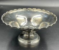 A Hallmarked silver bowl on single foot with scalloped edge, approximate total weight 77g 13cm D