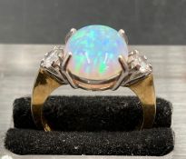 A Opal ring dress ring with CZ shoulders on silver setting Size N 1/2.